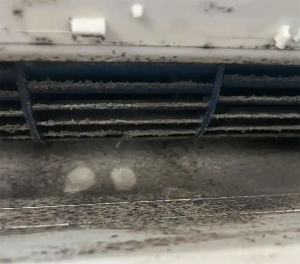 绥化市空调吹的风有股烧焦味是怎么回事